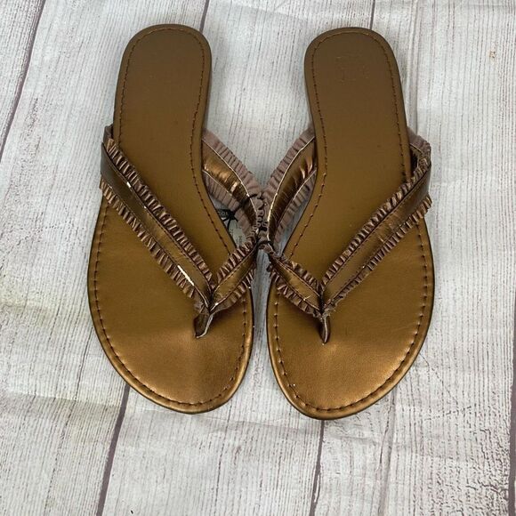 New York & Company Shoes - New York & Co new w/tags slip on ruffle strap flip flops bronze color women sz 8